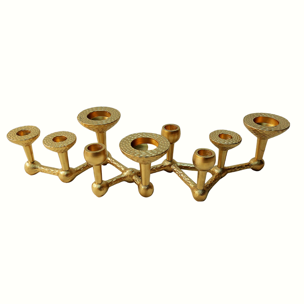 a Deeya Multi candle Centrepiece Candelabra set of brass candle holders.