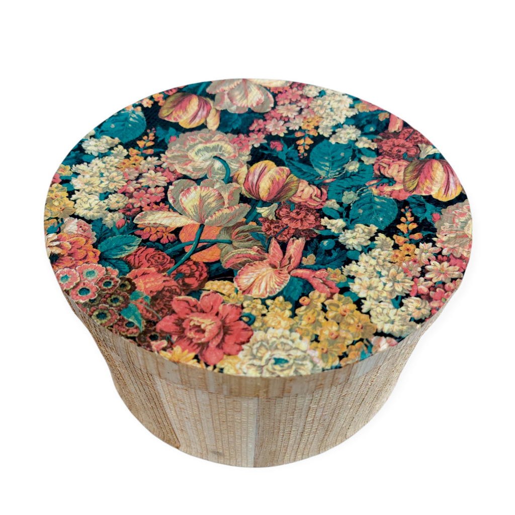 a Kela Round Storage box - Blue Floral with a floral pattern on it.