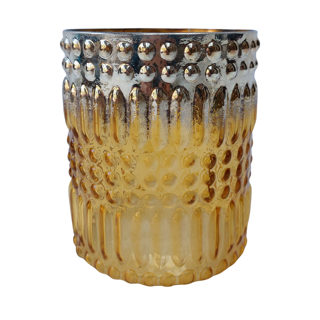 Anav Handmade glass tumbler shaped yellow tealight holder with bubble pattern and silver finish on the rim in a white background